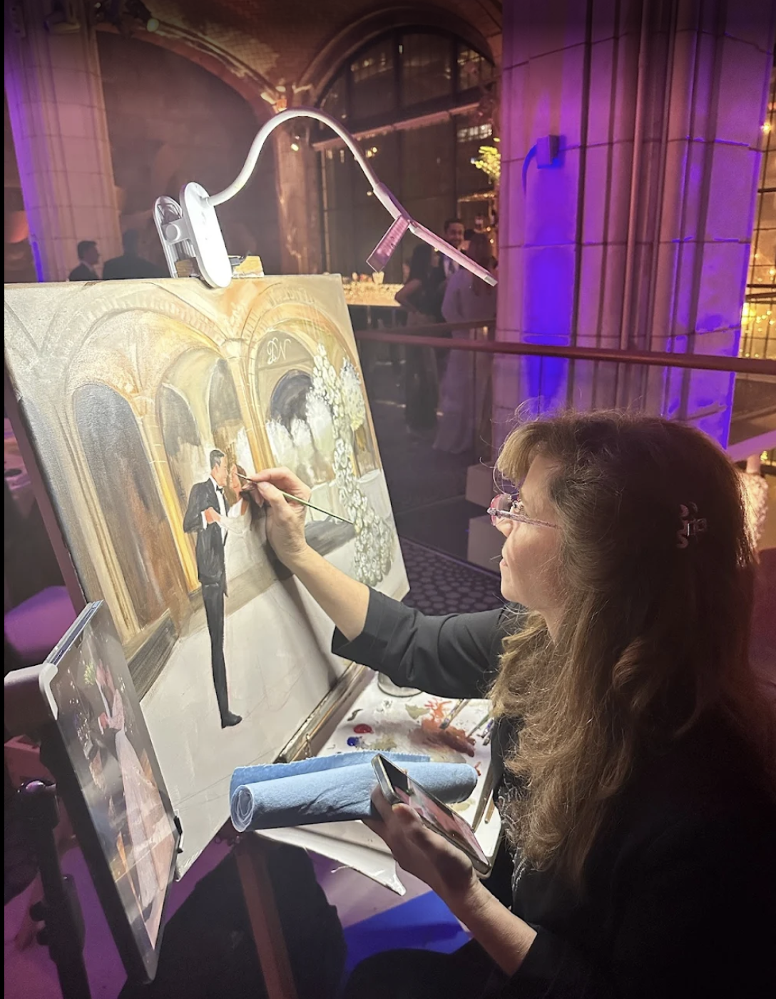 professional live painter linda marino painting during NYC wedding
